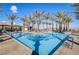Stunning community pool with palm trees offers a luxurious outdoor experience for residents at 49 Charlotte Ridge Pl, Henderson, NV 89011