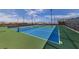 Well-maintained community tennis courts provide an opportunity for recreational sports and exercise at 49 Charlotte Ridge Pl, Henderson, NV 89011