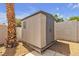 Exterior of the home with a shed for additional storage space at 4911 Ranchodomingo Ct, North Las Vegas, NV 89031