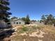 Spacious backyard featuring a large lot and potential for landscaping and outdoor activities at 5008 Donnie Ave, Las Vegas, NV 89130