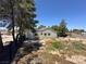 Large backyard with plenty of room for outdoor activities, potential for pool and landscaping at 5008 Donnie Ave, Las Vegas, NV 89130