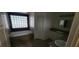 Bright bathroom with a large soaking tub, tiled walls, and dual vanities at 5008 Donnie Ave, Las Vegas, NV 89130