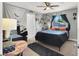 Stylish bedroom with modern decor, soft lighting, and a well-coordinated color scheme at 5008 Donnie Ave, Las Vegas, NV 89130