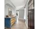 Entryway with decorative blue cabinet, marble top, and plank flooring at 5008 Donnie Ave, Las Vegas, NV 89130