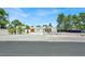 Charming single-story home with a stucco facade, double front doors, and well-manicured landscaping at 5008 Donnie Ave, Las Vegas, NV 89130