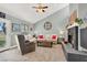 Comfortable living room featuring a brick fireplace and cozy seating at 5008 Donnie Ave, Las Vegas, NV 89130