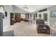 Bright, spacious living room with high ceilings, and rustic barn door accents at 5008 Donnie Ave, Las Vegas, NV 89130