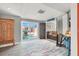 A naturally lit living room with sliding glass doors to the backyard and a comfortable seating area at 5008 Donnie Ave, Las Vegas, NV 89130