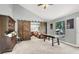 Bright, spacious living room with high ceilings, and rustic barn door accents at 5008 Donnie Ave, Las Vegas, NV 89130