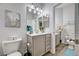 Bathroom with stylish vanity, modern fixtures, and tiled floors at 5220 Melbourne Ridge Ct, Las Vegas, NV 89141