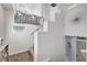 Bright staircase area with coat rack and stylish decor leading to the second floor at 5220 Melbourne Ridge Ct, Las Vegas, NV 89141