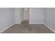 Neutral bedroom showcasing plush carpeting, neutral paint, and ample natural light at 5484 Mercury Springs Dr, Las Vegas, NV 89122