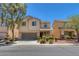 Inviting two-story home featuring a well-maintained yard and attached two-car garage, perfect for Gathering living at 5484 Mercury Springs Dr, Las Vegas, NV 89122