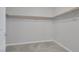 Spacious walk-in closet with ample shelving and clothing rods for optimal organization at 5484 Mercury Springs Dr, Las Vegas, NV 89122