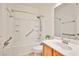 Clean bathroom featuring a tub/shower combination, a vanity sink, and modern fixtures at 5967 Sun Appello Ave, Las Vegas, NV 89122
