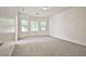 Spacious bedroom featuring plush carpeting, large windows, and ample natural light at 5967 Sun Appello Ave, Las Vegas, NV 89122