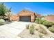 Charming single-story home featuring a well-manicured front yard, two-car garage, and neutral-toned exterior at 5967 Sun Appello Ave, Las Vegas, NV 89122