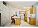 Bright kitchen with a breakfast bar, and tile flooring at 6131 Pumpkin Patch Ave, Las Vegas, NV 89142