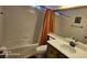 This is a bathroom with a vanity, toilet and shower/tub combo at 6275 Allspice Ct, Las Vegas, NV 89142