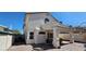 Home featuring a covered patio, second story balcony and desert landscaping at 6275 Allspice Ct, Las Vegas, NV 89142
