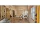 Grand foyer with decorative tile flooring, ornate furniture, and plenty of natural light at 6275 Allspice Ct, Las Vegas, NV 89142