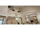 A view showcasing the high ceilings, with second story loft, of the entryway foyer at 6275 Allspice Ct, Las Vegas, NV 89142