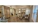 Elegant foyer featuring detailed woodwork, tile flooring, and stylish seating at 6275 Allspice Ct, Las Vegas, NV 89142