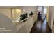 Hallway features hardwood floors and natural lighting at 6275 Allspice Ct, Las Vegas, NV 89142