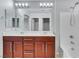 Bathroom boasts double sinks, modern fixtures, and a well-lit vanity mirror at 6678 Crystal Run Ln, Las Vegas, NV 89122