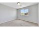 Bright bedroom with carpet and a view of the neighborhood through the window at 6678 Crystal Run Ln, Las Vegas, NV 89122