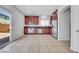 Bright kitchen featuring stainless steel appliances and dark granite countertops at 6678 Crystal Run Ln, Las Vegas, NV 89122
