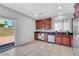 Well-lit kitchen featuring stainless steel appliances and sliding glass door at 6678 Crystal Run Ln, Las Vegas, NV 89122