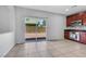 Open kitchen featuring stainless steel appliances, granite countertops, and sliding glass door at 6678 Crystal Run Ln, Las Vegas, NV 89122