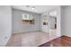 A cozy living room area with tile flooring and natural light from a window at 6678 Crystal Run Ln, Las Vegas, NV 89122