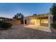 Private backyard featuring a covered patio, low-maintenance landscaping, and ample space for outdoor living at 713 Chase Tree St, Las Vegas, NV 89144