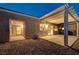 Private backyard featuring a covered patio, low-maintenance landscaping, and access to the home's interior at 713 Chase Tree St, Las Vegas, NV 89144