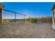 Large backyard with gravel and fencing provides privacy and mountain views at 713 Chase Tree St, Las Vegas, NV 89144