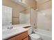 Functional bathroom features a single sink vanity and combined toilet/shower at 713 Chase Tree St, Las Vegas, NV 89144