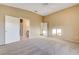 Carpeted main bedroom features access to ensuite bathroom and walk-in closet at 713 Chase Tree St, Las Vegas, NV 89144