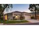Charming single-story home with a well-manicured lawn, two-car garage, and inviting curb appeal at 713 Chase Tree St, Las Vegas, NV 89144