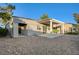 Home exterior with a covered patio overlooking mountain views at 713 Chase Tree St, Las Vegas, NV 89144