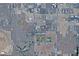 A high-altitude aerial view of a developed suburban area with many homes and businesses nearby at 7226 Freedom Ring St, Las Vegas, NV 89148