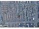 This is an aerial view of a neighborhood featuring neatly arranged homes and proximity to local shops and restaurants at 7226 Freedom Ring St, Las Vegas, NV 89148