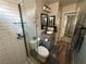 Modern bathroom featuring a glass-enclosed shower and stylish vanity with granite countertop at 7226 Freedom Ring St, Las Vegas, NV 89148