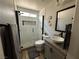 Modern bathroom featuring a glass-enclosed shower and stylish vanity with granite countertop at 7226 Freedom Ring St, Las Vegas, NV 89148