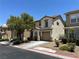 Charming two-story home featuring an attached garage and well-maintained landscaping at 7226 Freedom Ring St, Las Vegas, NV 89148