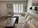 Comfortable living room features a large sectional couch and plenty of natural light at 7226 Freedom Ring St, Las Vegas, NV 89148
