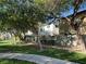 Beautiful neighborhood with well-maintained landscaping, mature trees, and manicured lawns at 7226 Freedom Ring St, Las Vegas, NV 89148