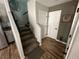 Carpeted staircase with wood flooring and natural light, leads to upper level at 7226 Freedom Ring St, Las Vegas, NV 89148