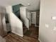 View of staircase with wood flooring and modern finishes, leading to the upper level at 7226 Freedom Ring St, Las Vegas, NV 89148